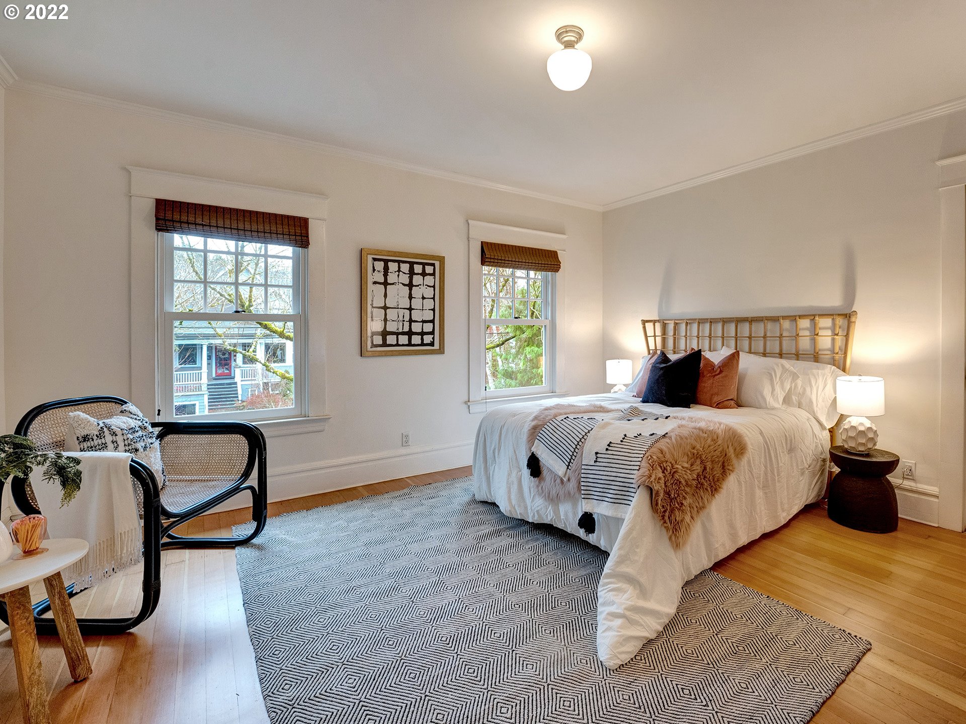 2307 Northeast Couch Street Portland, OR 97232 - Photo 15 of 32 a bedroom with a bed and window