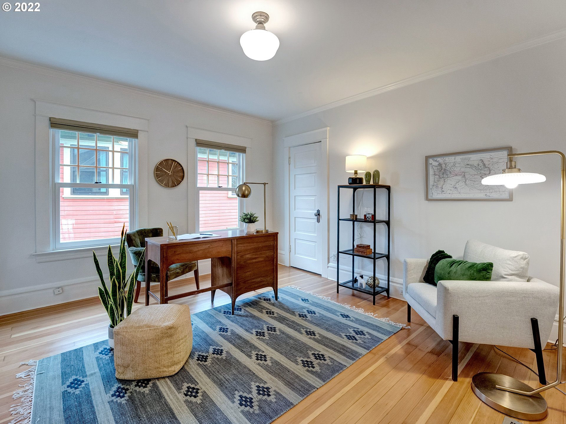 2307 Northeast Couch Street Portland, OR 97232 - Photo 17 of 32 a living room with furniture and wooden floor