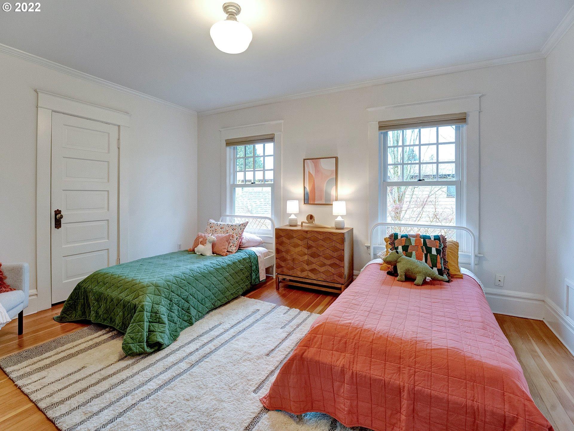 2307 Northeast Couch Street Portland, OR 97232 - Photo 18 of 32 a bedroom with a bed and window