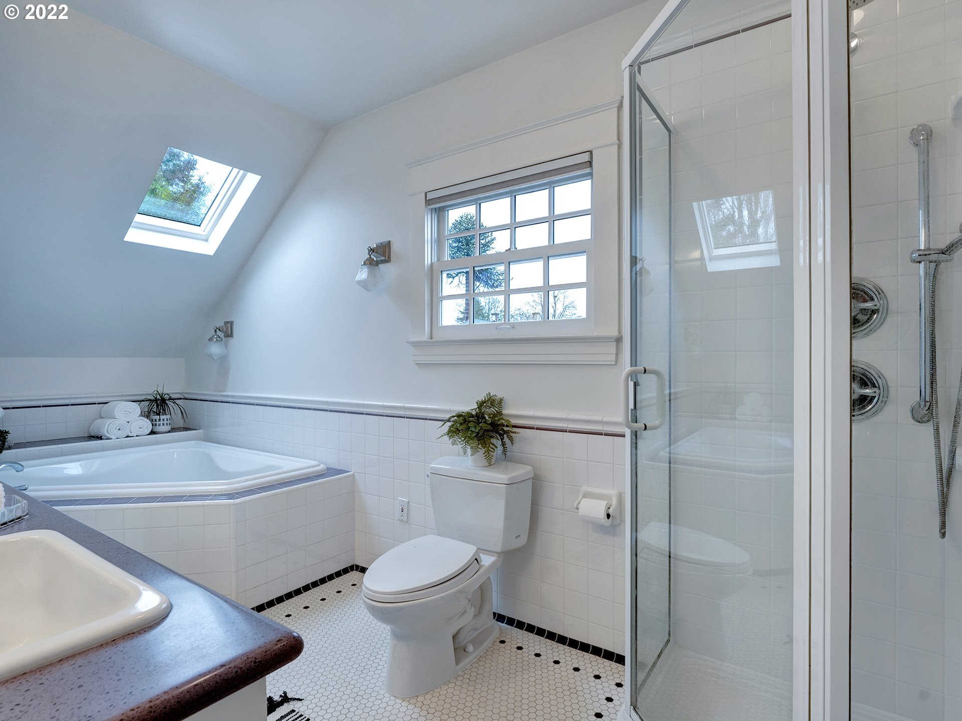 2307 Northeast Couch Street Portland, OR 97232 - Photo 19 of 32 a bathroom with a sink toilet and shower