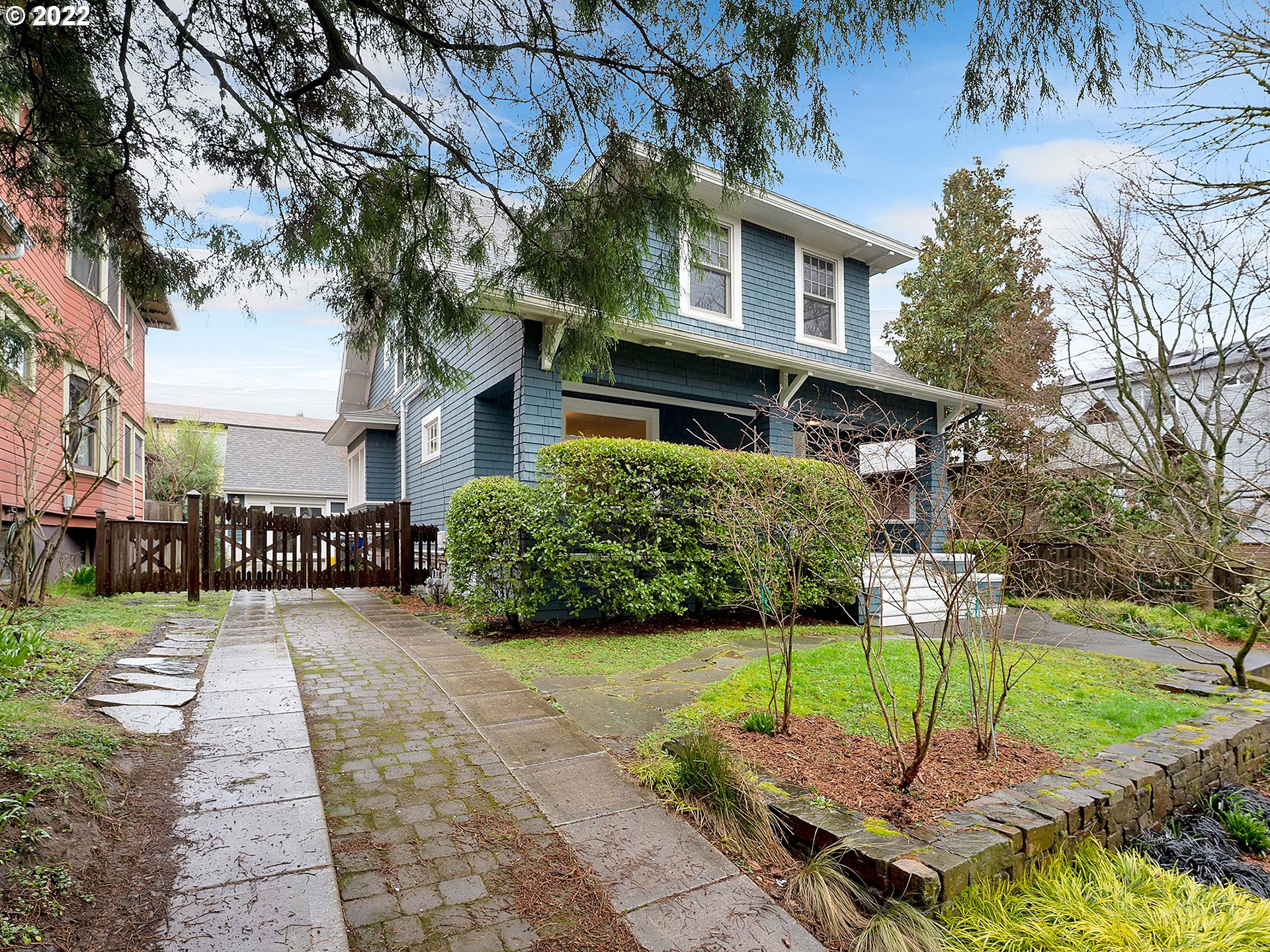 2307 Northeast Couch Street Portland, OR 97232 - Photo 2 of 32 a house view with a garden space