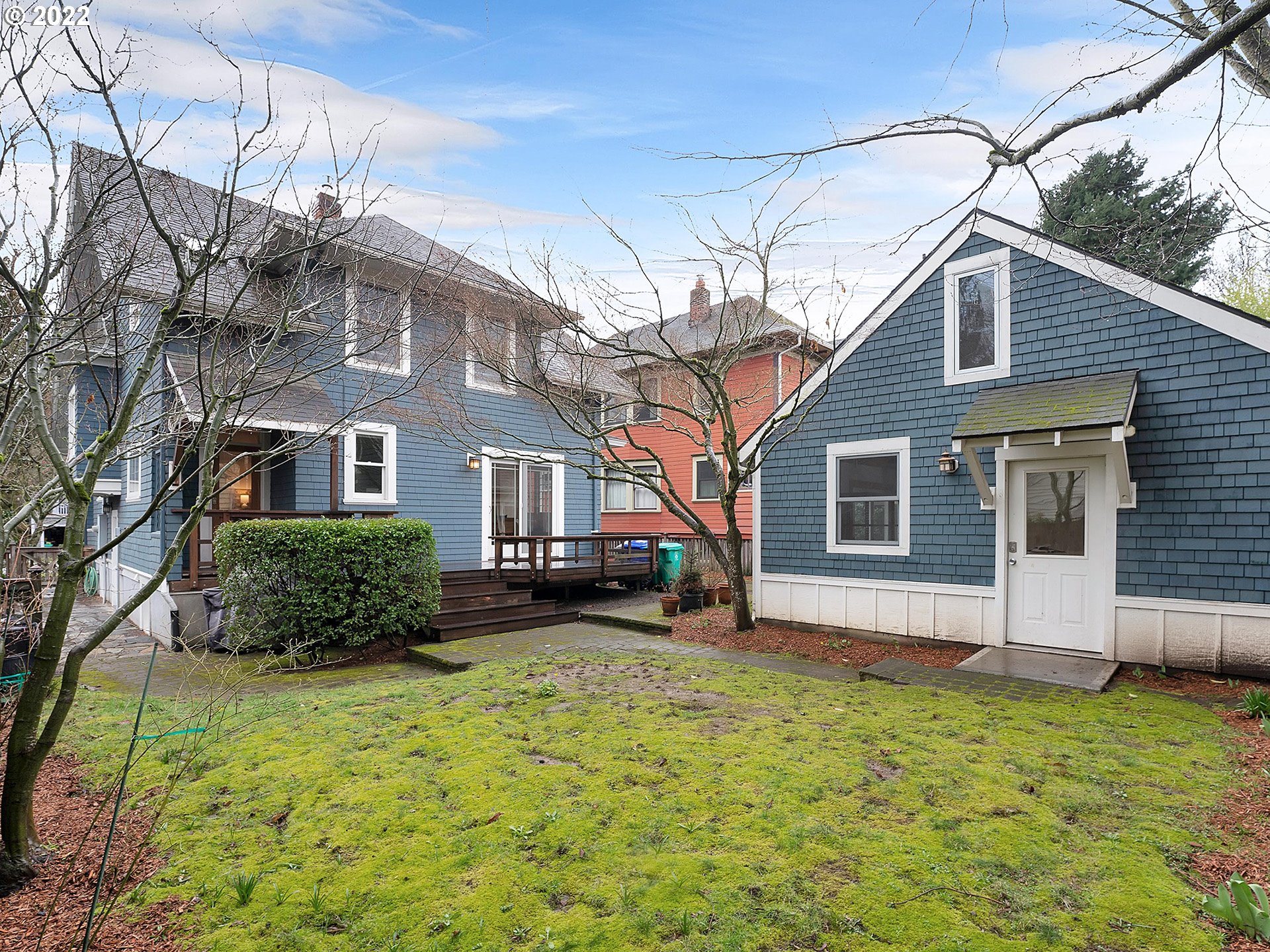 2307 Northeast Couch Street Portland, OR 97232 - Photo 29 of 32 a front view of a house with a yard