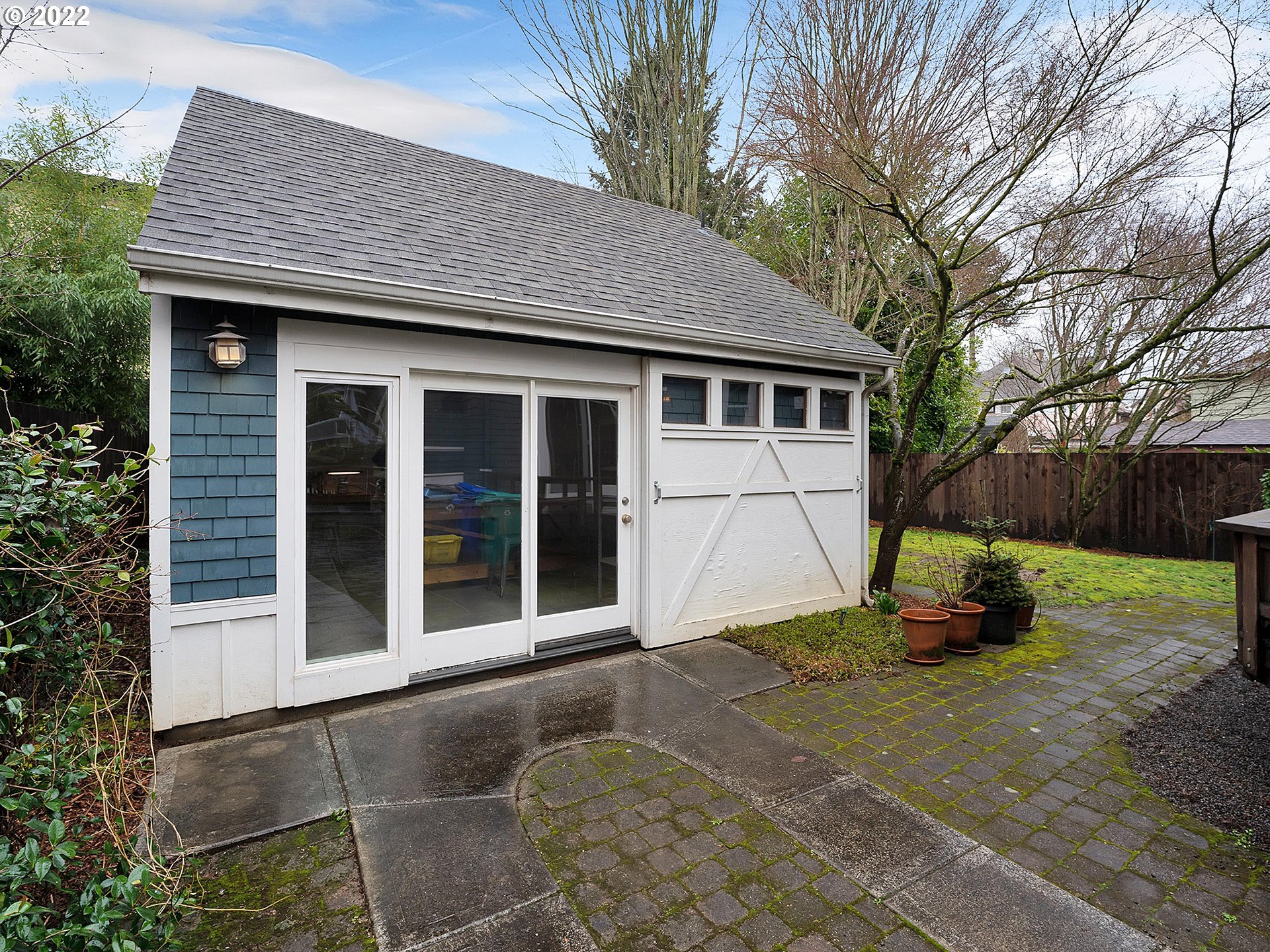 2307 Northeast Couch Street Portland, OR 97232 - Photo 30 of 32 a front view of a house with a yard