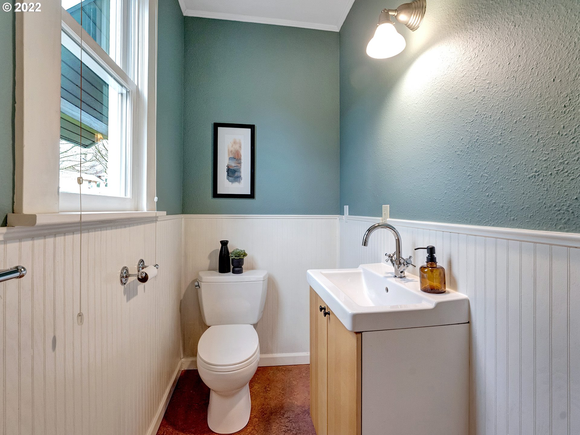2307 Northeast Couch Street Portland, OR 97232 - Photo 9 of 32 a bathroom with a sink mirror and toilet