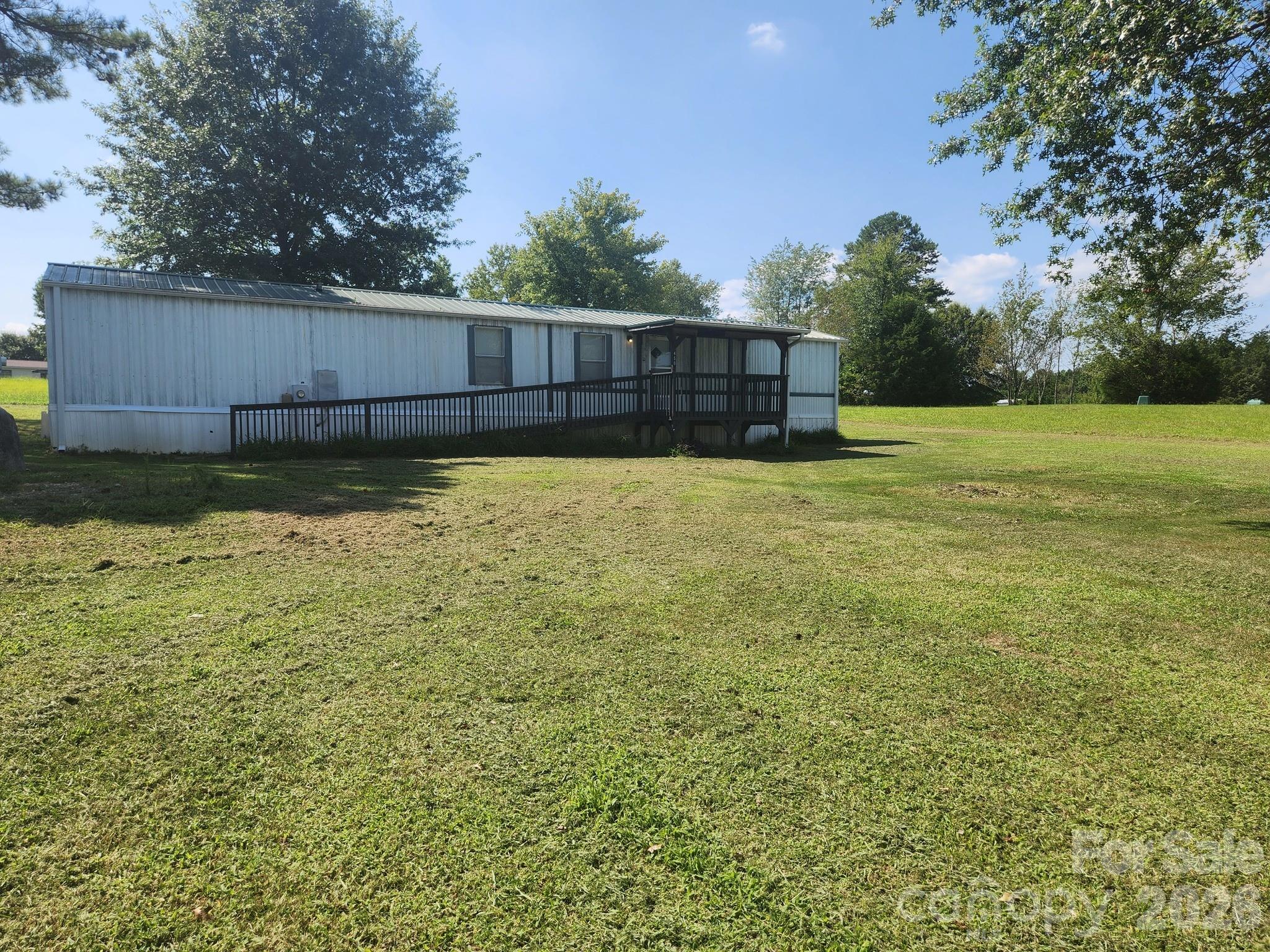 450 Ridgeland Drive Cleveland, NC 27013 - Photo 2 of 14 a view of a backyard