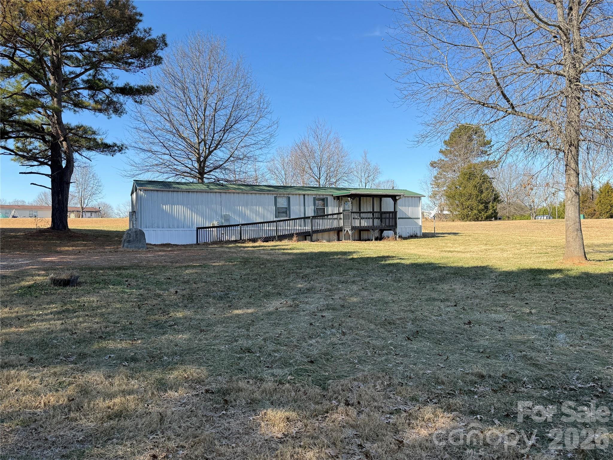 450 Ridgeland Drive Cleveland, NC 27013 - Photo 3 of 14 a view of a house with a yard