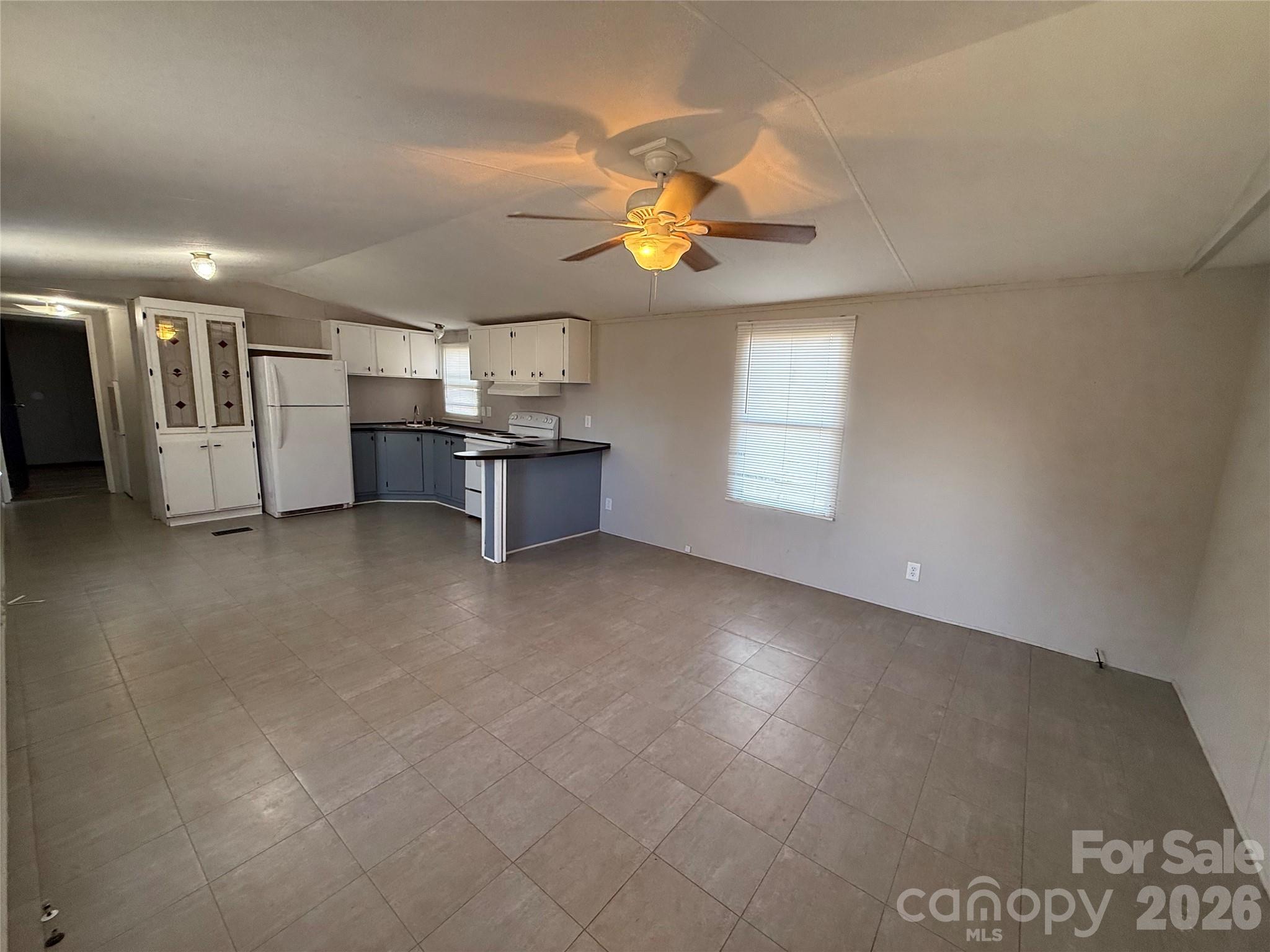 450 Ridgeland Drive Cleveland, NC 27013 - Photo 4 of 14 a view of an empty room with a window