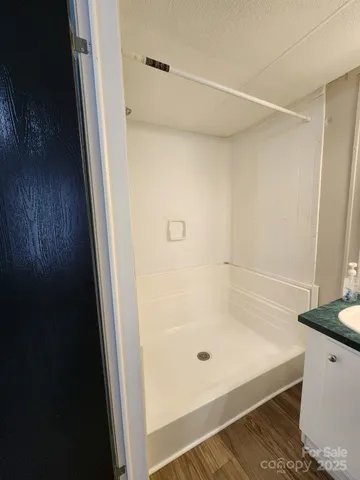 a bathroom with a bath tub