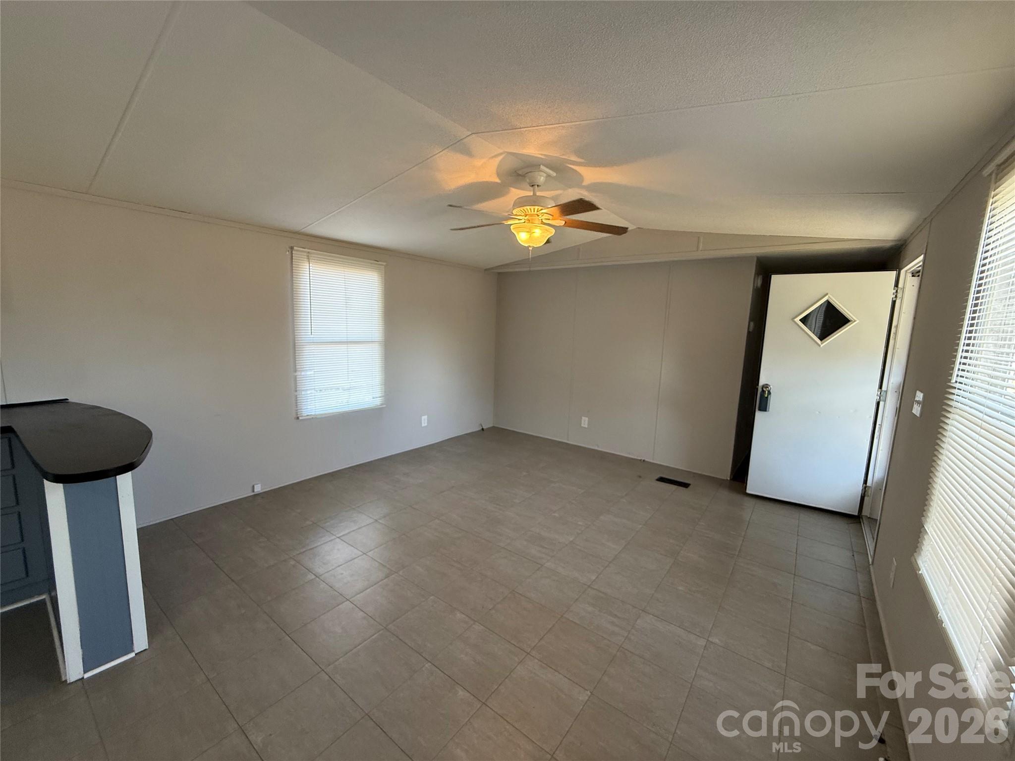 450 Ridgeland Drive Cleveland, NC 27013 - Photo 6 of 14 a view of empty room with window