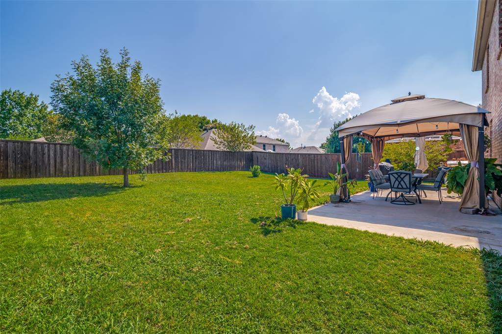 10702 Augusta Lane Rowlett, TX 75089 - Photo 25 of 25 a swimming pool view with a seating space