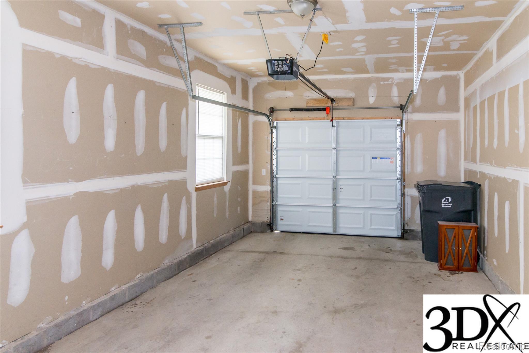 4256 Hampton Ridge Boulevard Howell, MI 48843 - Photo 25 of 25 Single garage door with opener