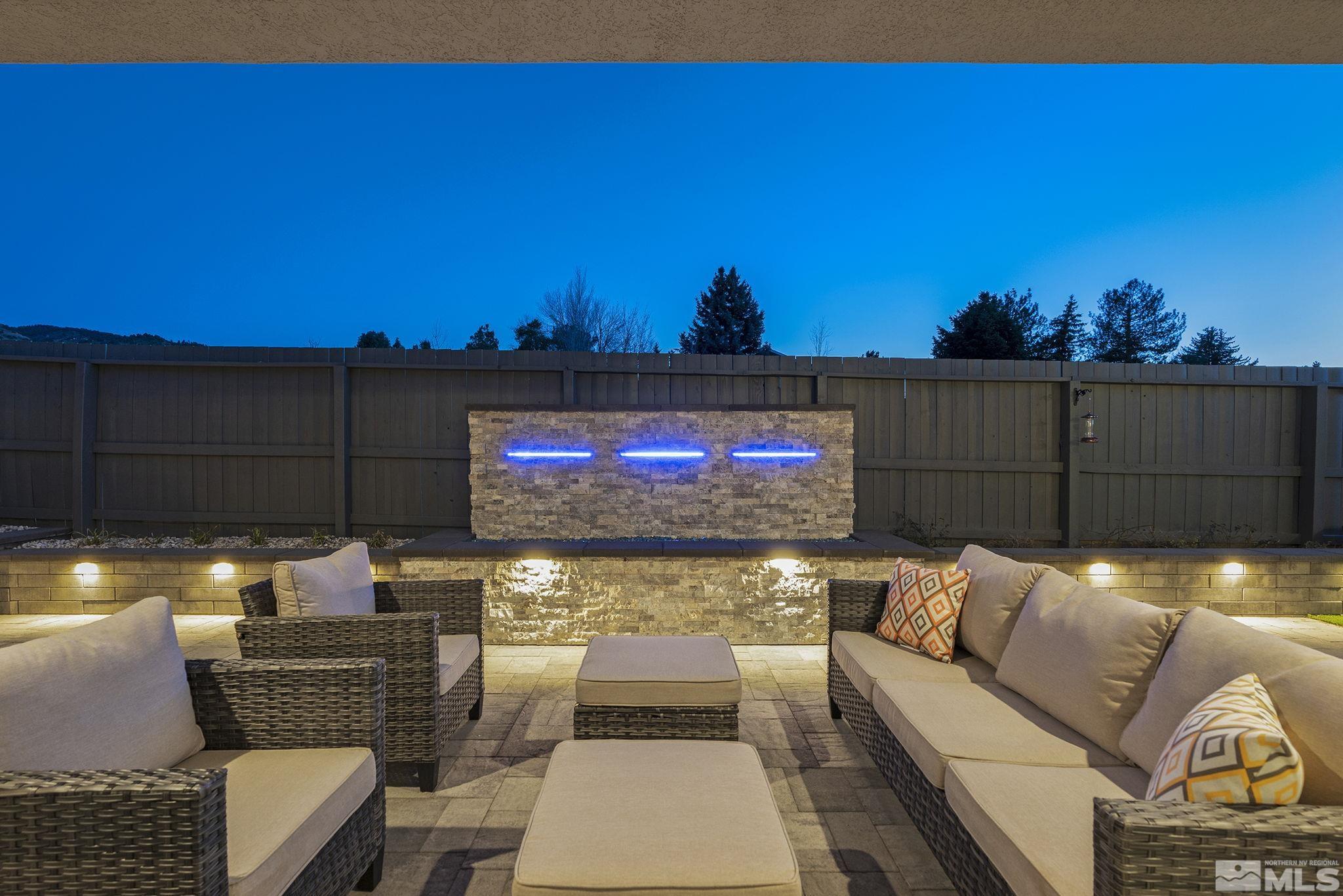 3012 Feathertop Drive Reno, NV 89521 - Photo 15 of 40 a living room with furniture and a flat screen tv