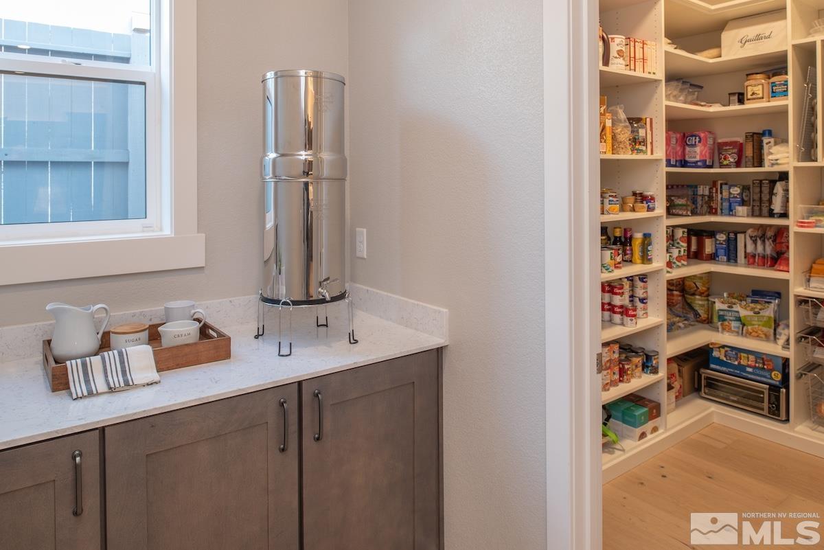 3012 Feathertop Drive Reno, NV 89521 - Photo 19 of 40 a view of bathroom with a sink cabinet and a window