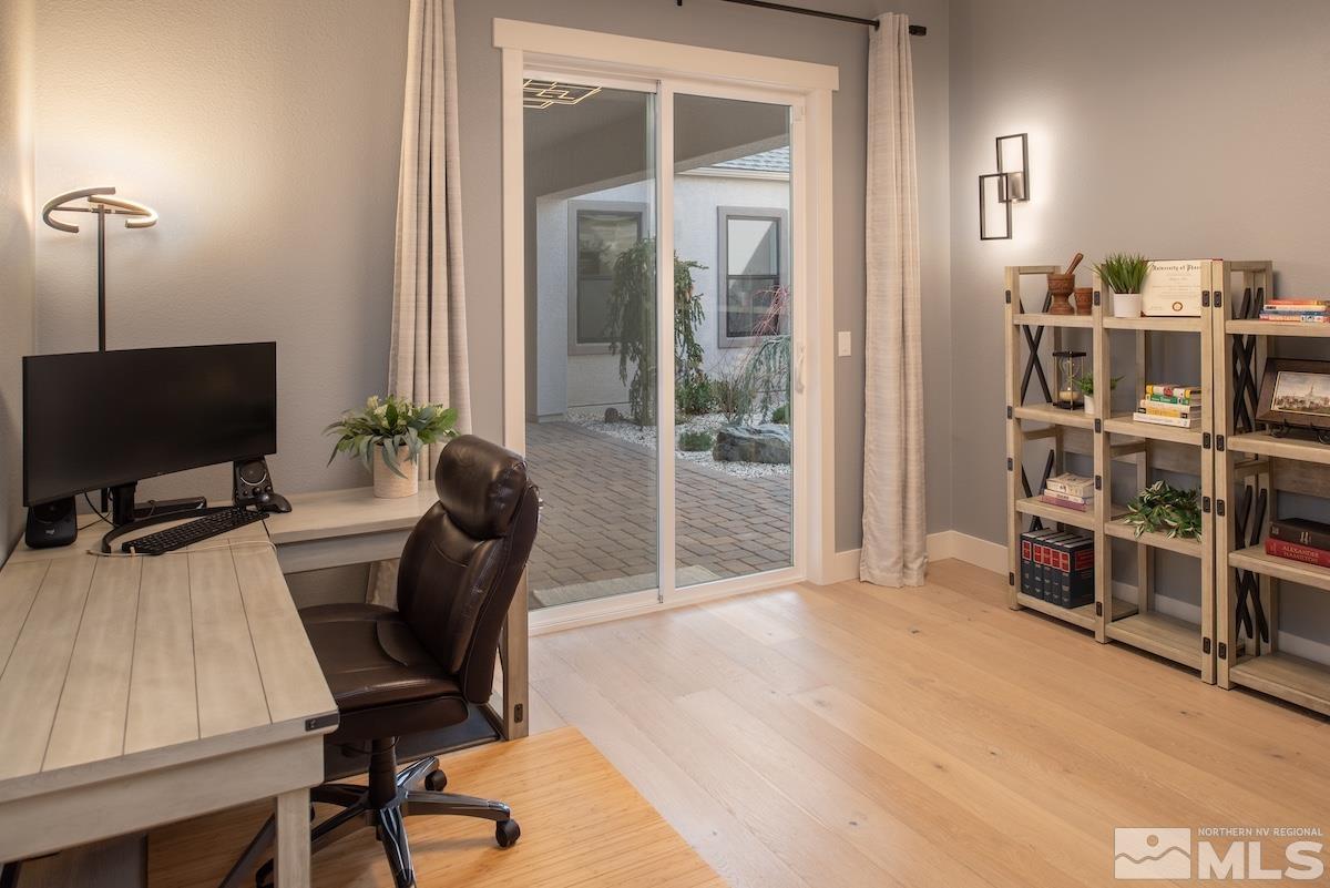 3012 Feathertop Drive Reno, NV 89521 - Photo 22 of 40 a view of a workspace with furniture and a window