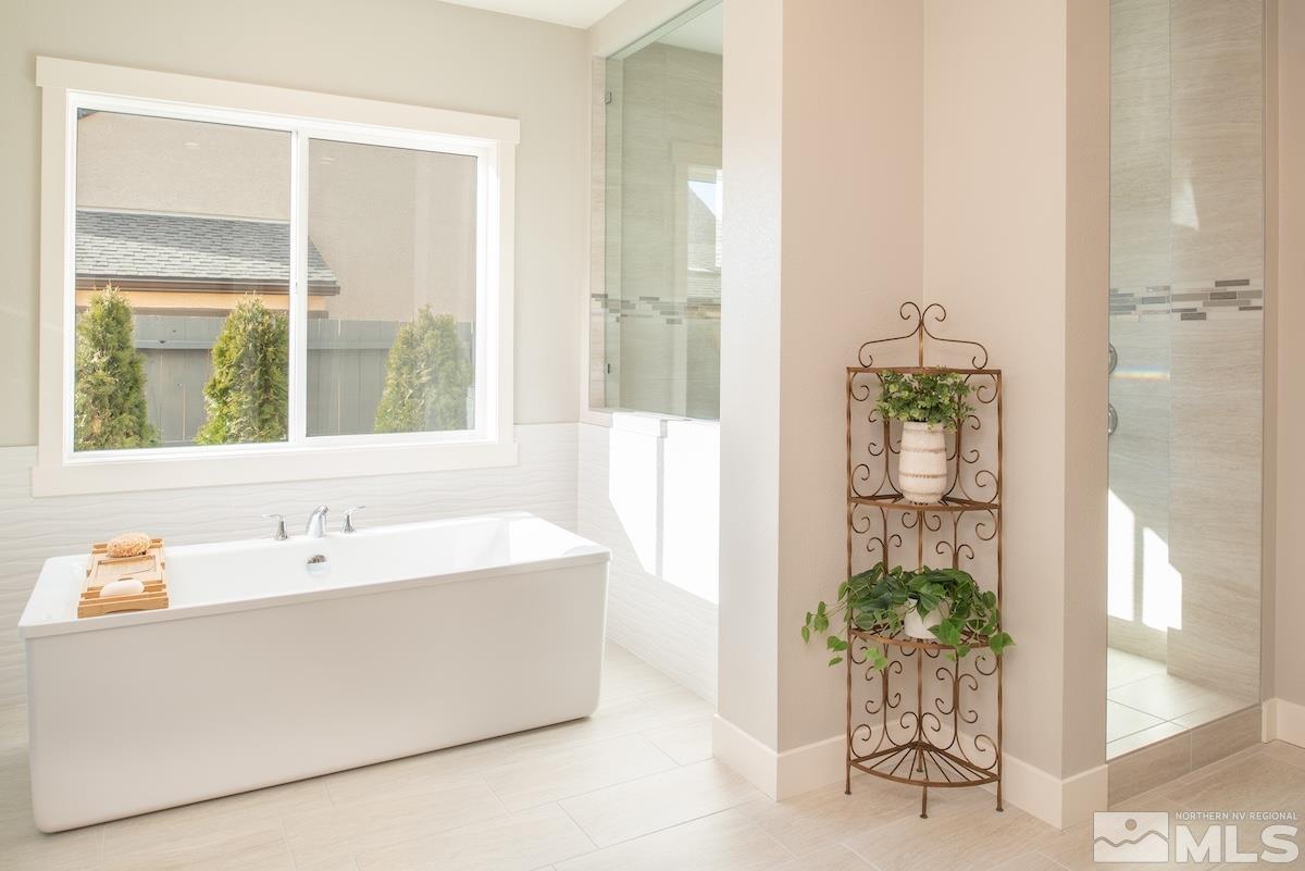 3012 Feathertop Drive Reno, NV 89521 - Photo 24 of 40 a bathroom with a bathtub and a sink