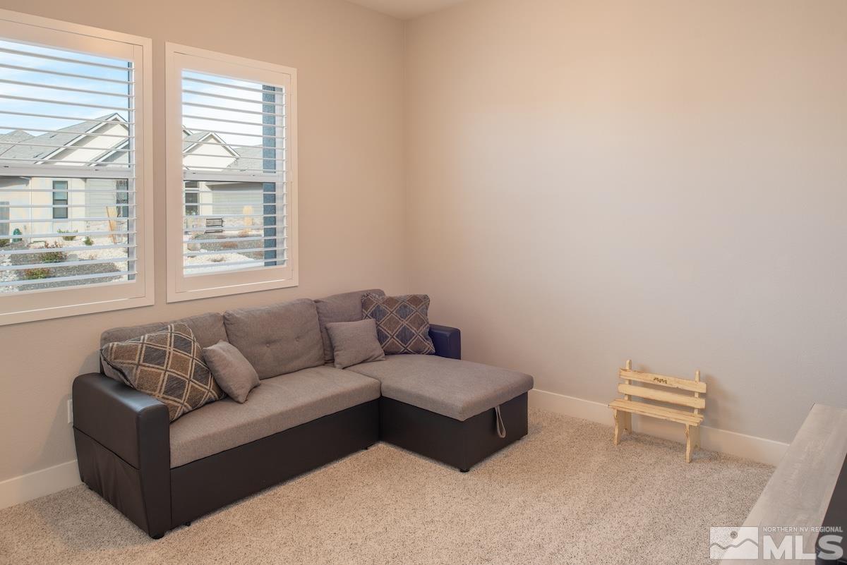 3012 Feathertop Drive Reno, NV 89521 - Photo 29 of 40 a living room with furniture and a window
