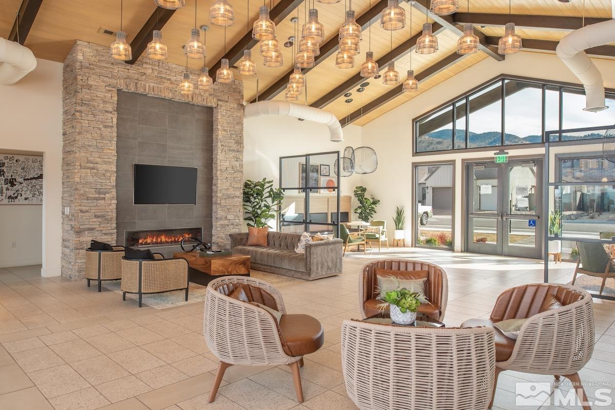 3012 Feathertop Drive Reno, NV 89521 - Photo 35 of 40 a living room with furniture and a flat screen tv