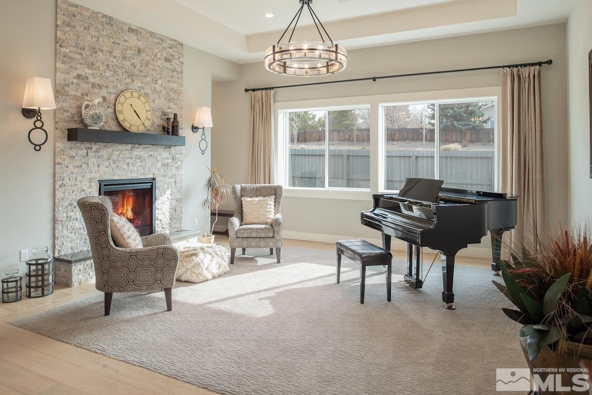 3012 Feathertop Drive Reno, NV 89521 - Photo 5 of 40 a living room with furniture and a fireplace