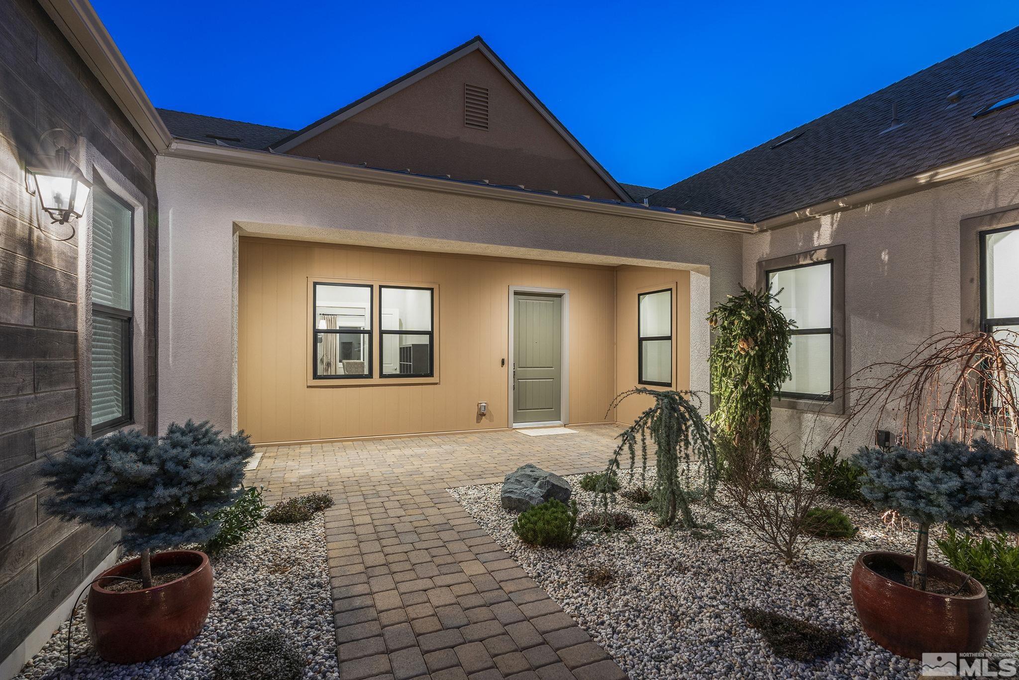 3012 Feathertop Drive Reno, NV 89521 - Photo 7 of 40 a front view of a house with garden