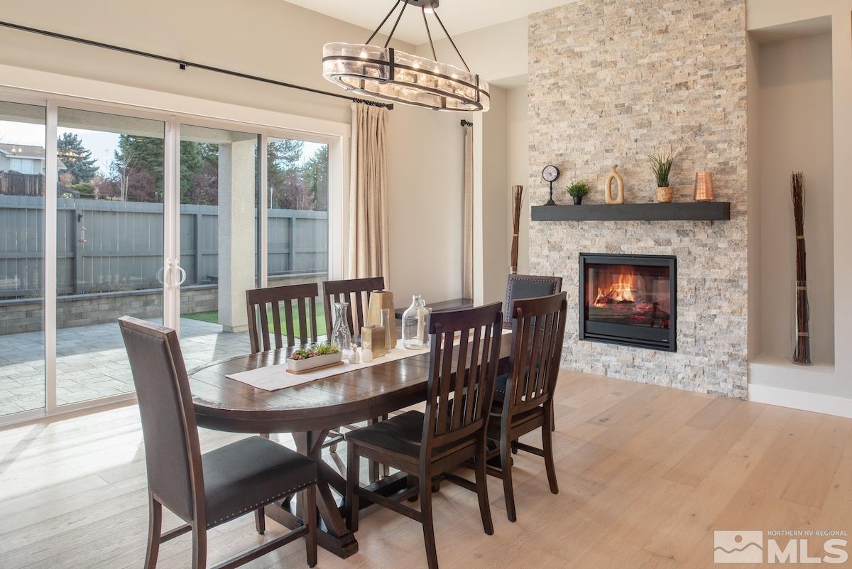 3012 Feathertop Drive Reno, NV 89521 - Photo 9 of 40 a view of a dining room with furniture window and outside view
