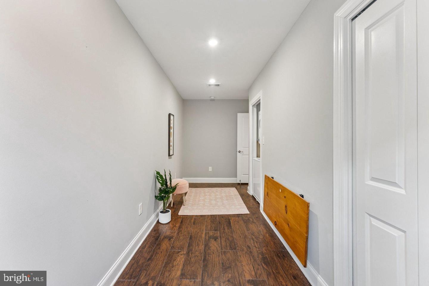 718 Jackson Street Northeast, Unit 1 Washington, DC 20017 - Photo 17 of 22 a view of gallery with wooden floor