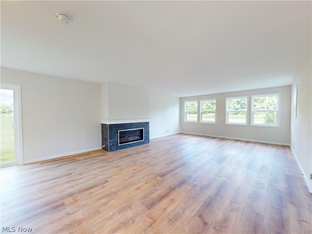 12395 Winchell Road Painesville, OH 44077 - Photo 17 of 46 Sleek Modern Gas Fireplace in Living room