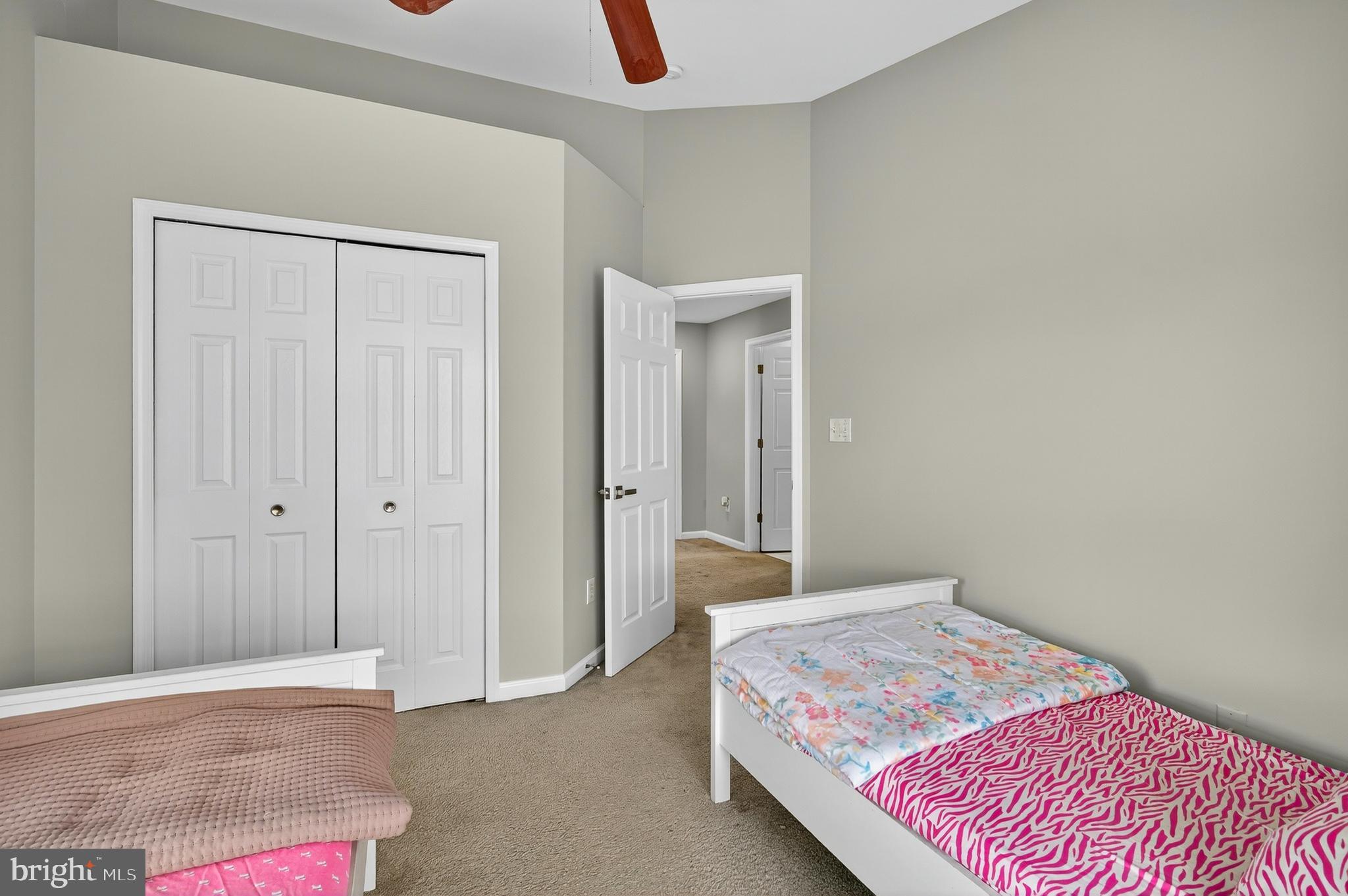 2046 University Boulevard West, Unit 12 Silver Spring, MD 20902 - Photo 23 of 64 a bedroom with a bed and a rug