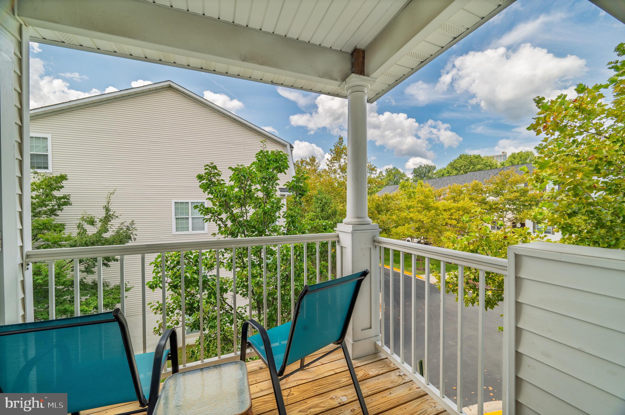 2046 University Boulevard West, Unit 12 Silver Spring, MD 20902 - Photo 36 of 64 a view of a balcony with furniture
