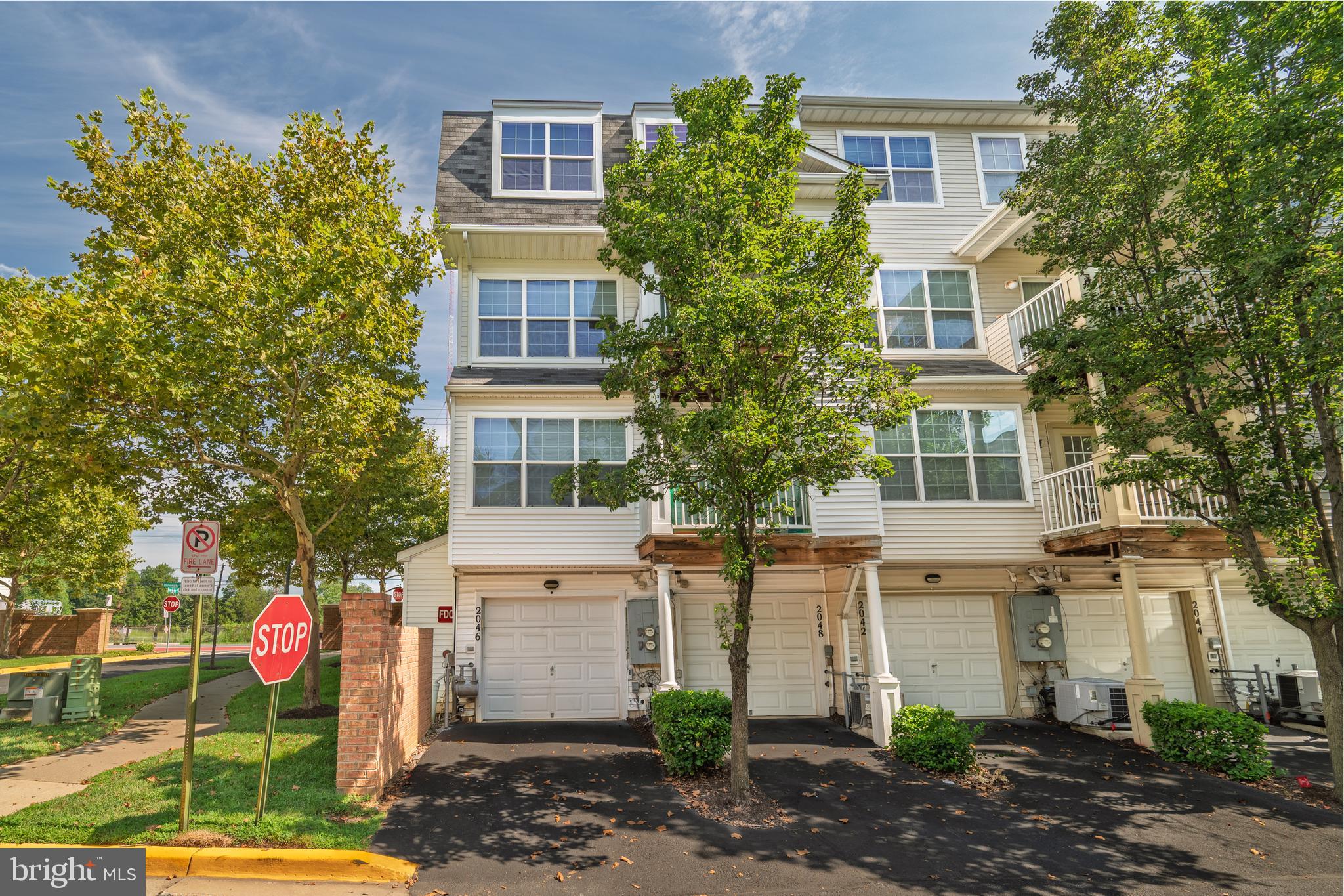 2046 University Boulevard West, Unit 12 Silver Spring, MD 20902 - Photo 42 of 64 a front view of a multi story residential apartment building