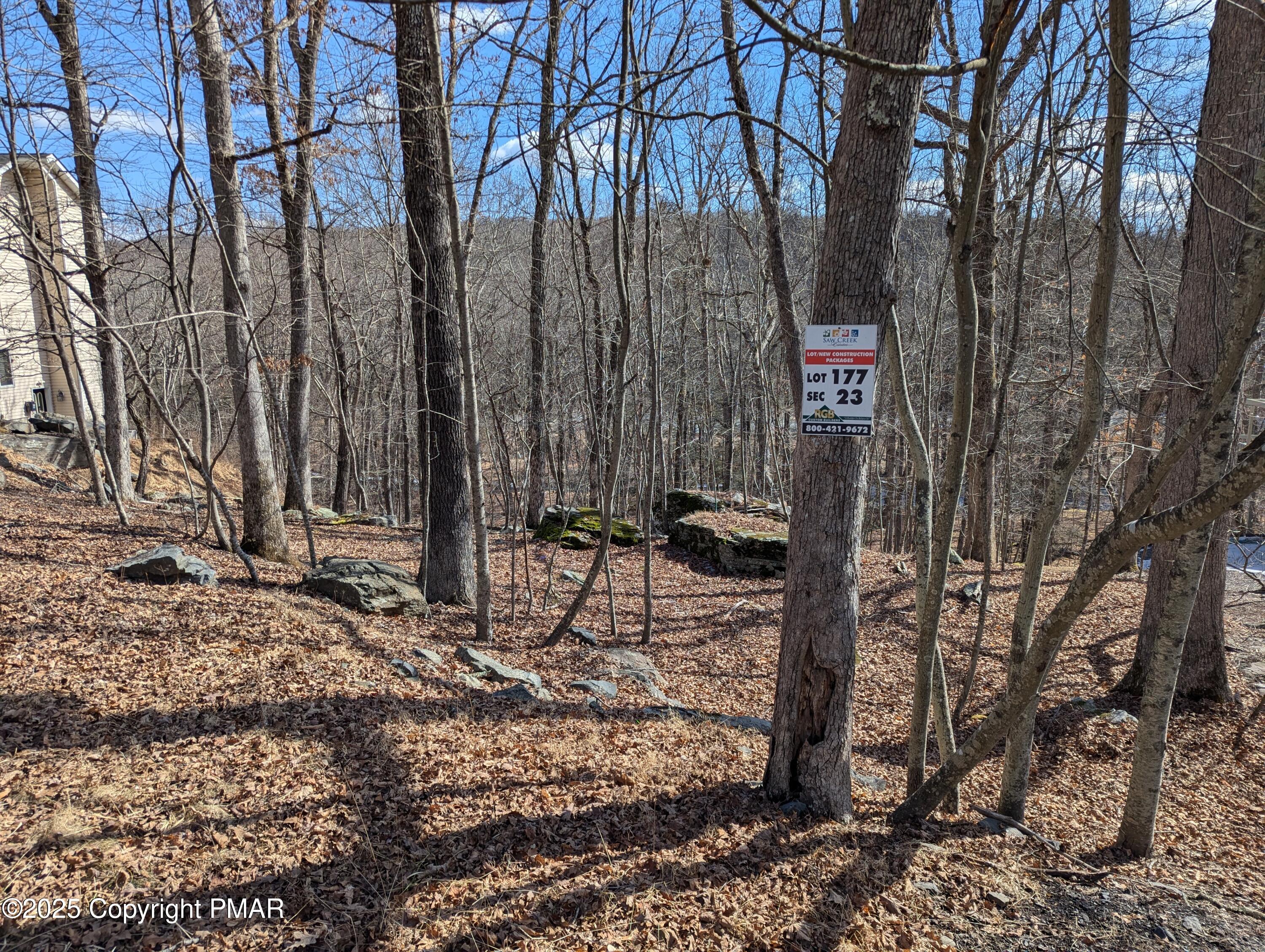 Lot 177 Decker Road Bushkill, PA 18324 - Photo 1 of 4 a view of a forest with a tree