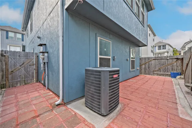 a balcony view with a backyard space