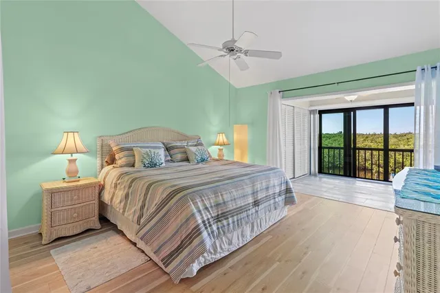 a utility room with lots of clutter and chairs