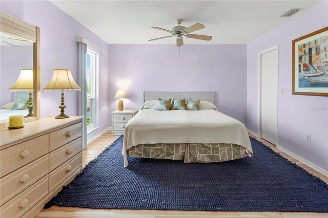 a kitchen with stainless steel appliances a refrigerator and a table