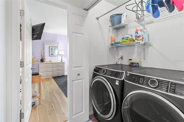 an aerial view of a house with yard swimming pool and outdoor seating