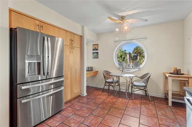 an aerial view of a house with a garden and swimming pool