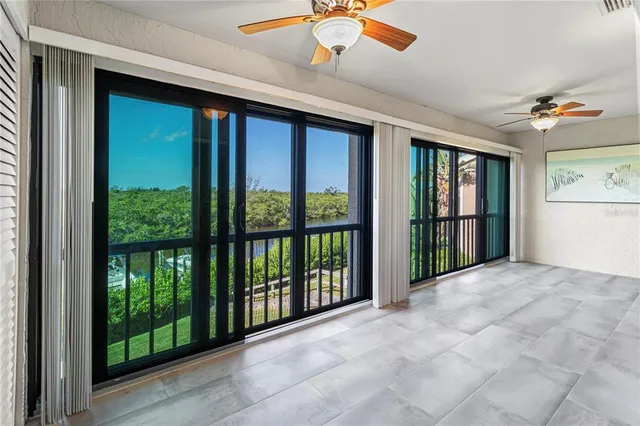a living room with furniture fireplace and flat screen tv