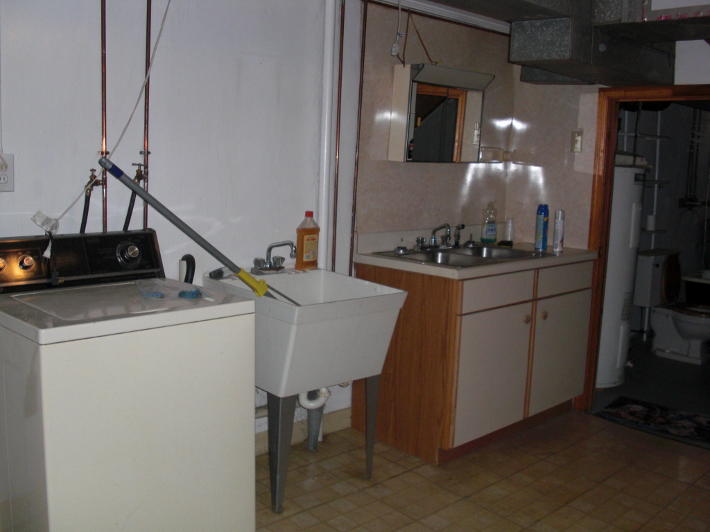 12083 Hardy Road Hardy, VA 24101 - Photo 12 of 19 a kitchen with a sink stove and cabinets