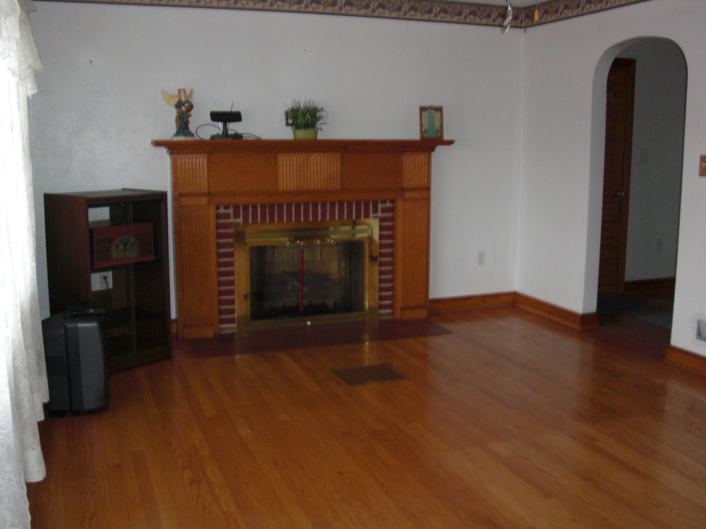 12083 Hardy Road Hardy, VA 24101 - Photo 3 of 19 a living room with furniture and a fireplace