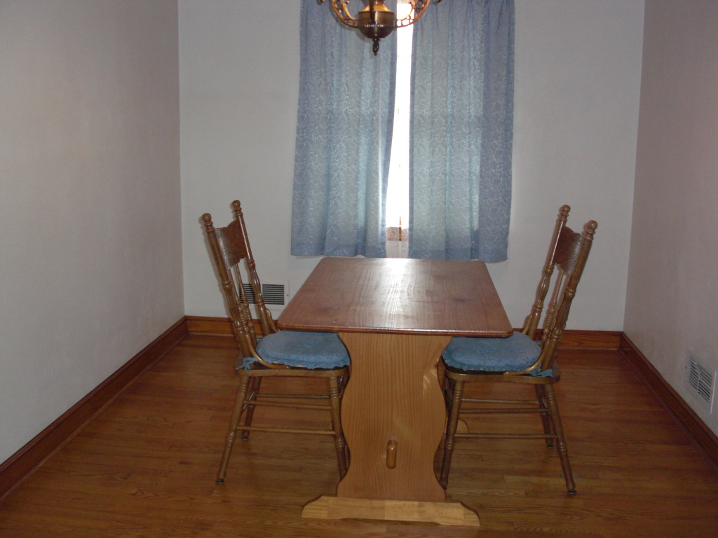 12083 Hardy Road Hardy, VA 24101 - Photo 4 of 19 a view of a dining room with furniture and wooden floor