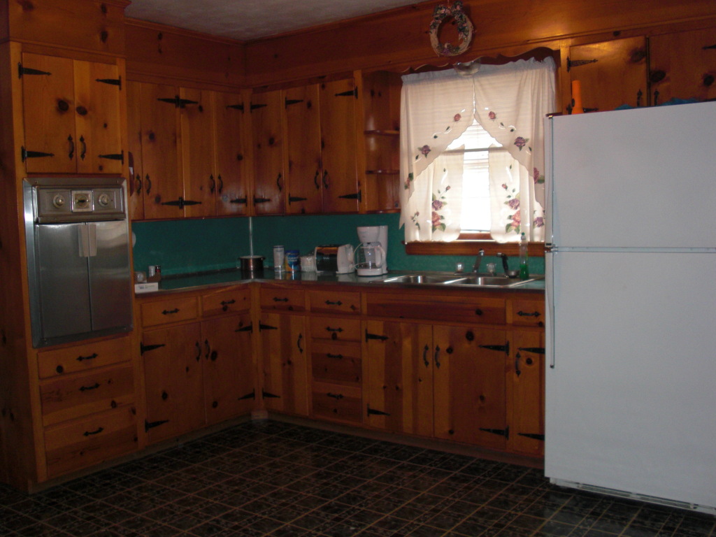 12083 Hardy Road Hardy, VA 24101 - Photo 5 of 19 a kitchen with stainless steel appliances a refrigerator and a stove