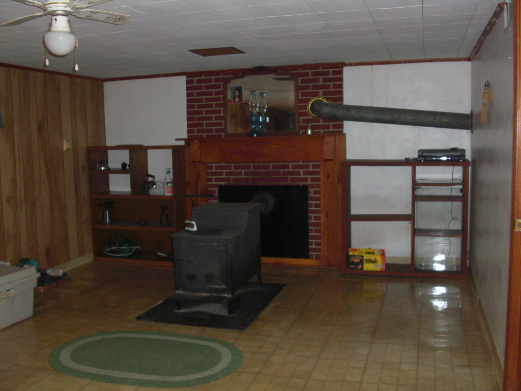 12083 Hardy Road Hardy, VA 24101 - Photo 6 of 19 a living room with furniture and a fireplace