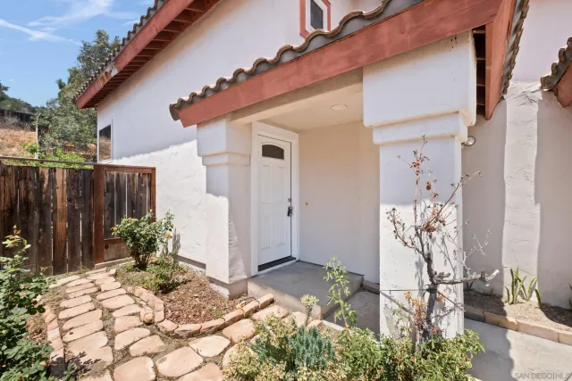 an aerial view of a city with mountains ocean and mountain view