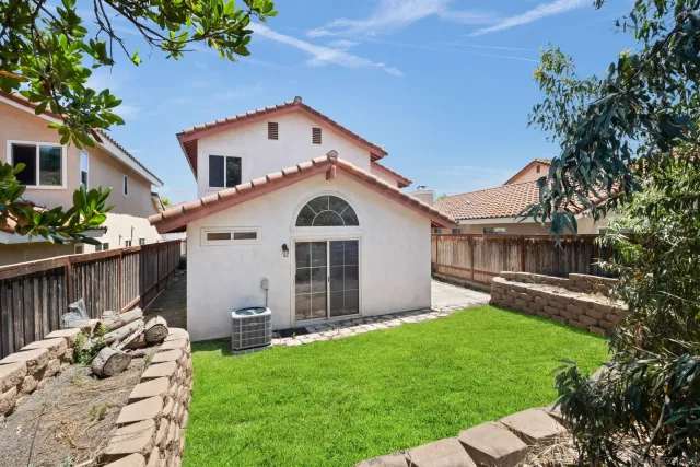 an aerial view of a city with mountains ocean and mountain view