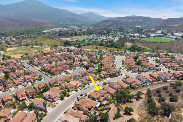 an aerial view of residential house with parking space