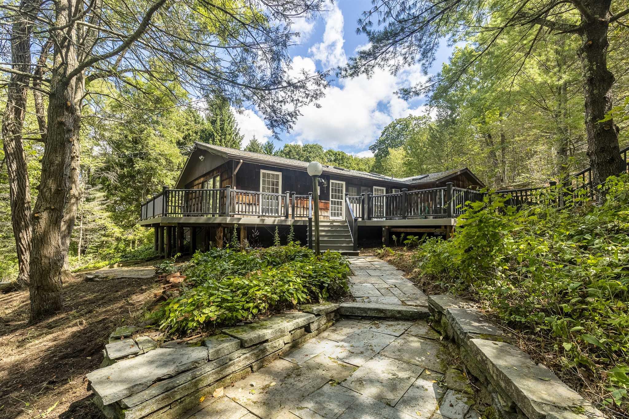 a house with trees in the background
