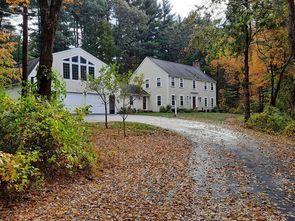138 Draper Road Wayland, MA 01778 - Photo 8 of 15 a view of a house with a yard