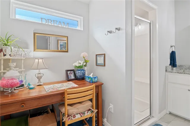 a room with a table and chairs