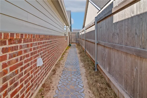 a view of balcony with wooden floor