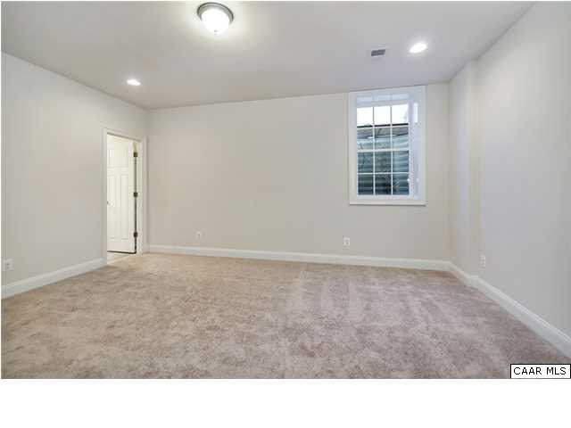 2106 Avinity Loop Charlottesville, VA 22902 - Photo 11 of 18 a room with high traffic carpet and a window