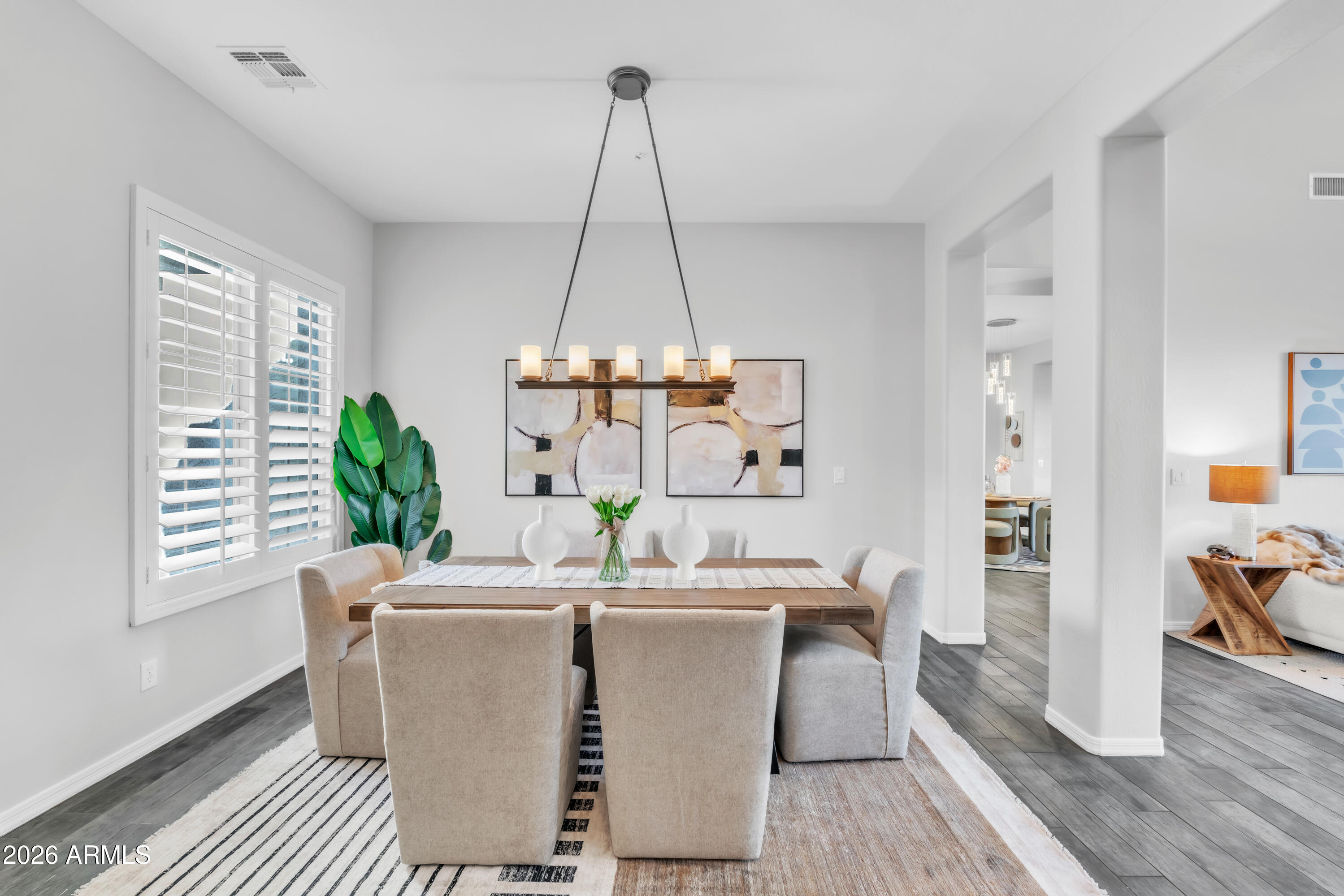 1615 West Red Fox Road Phoenix, AZ 85085 - Photo 6 of 64 a dining room with furniture and window